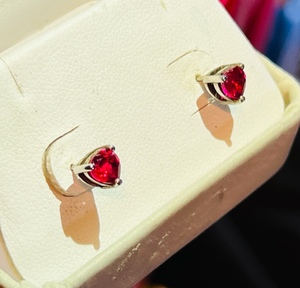 lot 141 image: .925 Sterling Silver Earrings WRed Stones