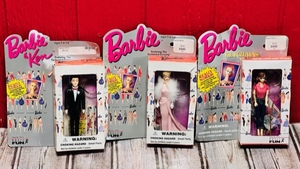 lot 172 image: Three Barbie Doll Keychains by Basic Fun - Picnic Barbie (Retired) &amp The Enchanted Evening Barbie And Ken