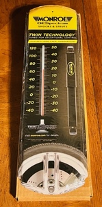 lot 214 image: Monroe DESpectrum Shocks &amp StrutsMetal Hanging Thermometer