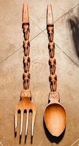 lot 234 image: 32 Long Carved Wooden Spoons - Carved With Elephant Designs