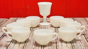lot 259 image: Vintage White Milk Glass Harvest Grape Pattern Goblet &amp Nine CoffeeTea Cups Indiana Glass