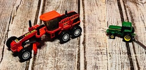 lot 277 image: 164 Matchbox MBX Adler Road Grader R-125 &amp Vintage John Deere Tractor Key Chain