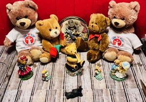 lot 290 image: Large Lot of Bears Looking For a Loving Home - Includes Two Build-A-Bear Teddy Bears &amp Vintage Mid-Century Porcelain Bear Playing Horn