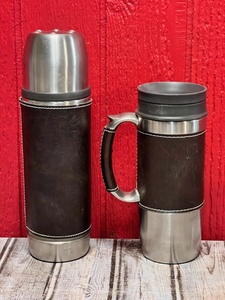 lot 310 image: Cutter & Buck Leather Wrapped Stainless Steel Thermos & Cutter& Buck Leather Wrapped Stainless Steel Thermos Made For Barns & Noble