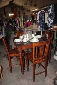 lot 11 image: Dark Wood Square Dinning Room Table and 4 Matching Chairs (dishes not included)
