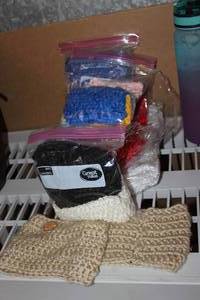 lot 231 image: Large Quantity of unused Infant Head bands and Hats, you can add bows to these