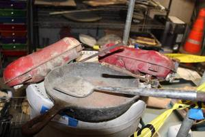 lot 54 image: Cast Iron Skillet and Fuel Burner Tanks