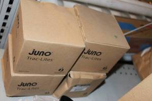 lot 134 image: Four Juno Trac-Lites Black in Color