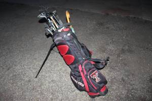 lot 301 image: Set of Golf Clubs and Umbrella