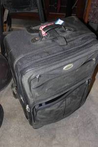 lot 348 image: Large Rollig Suitcase