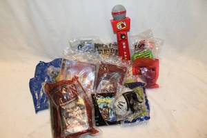 lot 483 image: Karaoke Microphones, unopened Kids Meal Toys