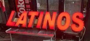 lot 276 image: Light Up Latinos Sign Approximated at 8ft long