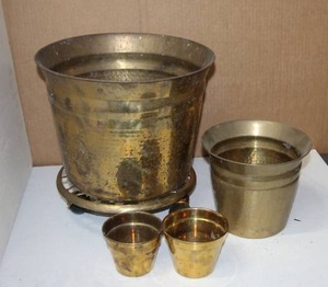 lot 47 image: Brass Plant pots and rolling plant caddie