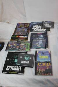 lot 54 image: Strategy Guides and Games Nascar racing, Flight Simulator, Lighth Use, Spycraft