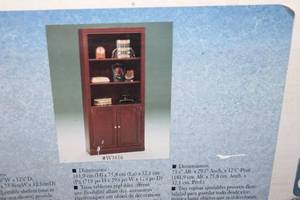 lot 63 image: Bookcase still in Box - 71-58H x 29-78W x 12-58D