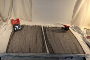 lot 95 image: Metal fireplace curtain, Emblem Hitch Receiver cover SIP, and Antique car Coin Bank
