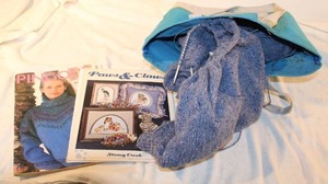 lot 101 image: Knitting Lot Partially knitted piece, yarn and books