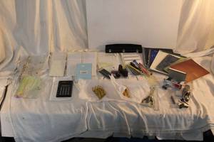lot 105 image: Office Lot notepads, 3-hole punch, scissors, staple remover, calculator