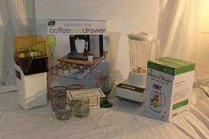 lot 108 image: Bamboo coffee pod drawer, Air popcorn popper, Fina 40th Anniversary Glass set, Hamilton Beach Blender, Glass Pitcher SIB