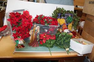 lot 111 image: (25) Bushels of Artificial Poinsettias, Ribbons, bows, tags and ceramic figurine