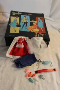 lot 119 image: Vintage Barbie in case with accessories printed 1961