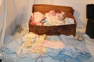 lot 76 image: Vintage Baby clothes (Nitey-nite, Thomas, Honeysuckle, Baby-Debs, Huntingdon Mills, Babes, Tiny tots, and Carters brands) and shoes (one with original box)