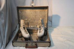 lot 143 image: Vintage Roller Skates with hard case