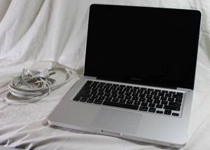 lot 4 image: Apple MacBook Pro 13.3 laptop w power cord
