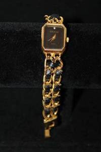 lot 203 image: Signed Joan Rivers Classics gold tone and leather watch with diamond marker. Marked Joan Rivers Classics. 7.25L