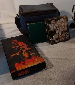 lot 43 image: Rock and Roll Lot ACDC collection CDs, poster, Marshall Tucker Band CD Collector Box, Pink Floyd PosterCD, Plus cassettes
