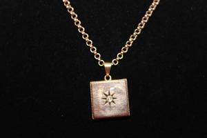 lot 206 image: 10K yellow gold antique Victorian and Diamond hair mourning locket on 16 square link chain.