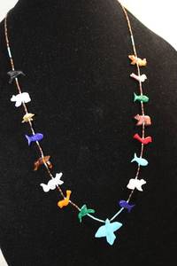 lot 208 image: Zuni Artisan crafted multi gemstone fetish necklace. 26L.