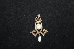 lot 184 image: 10K yellow gold Turquoise and seed Pearl vintage pendant. Marked 10K. Approx. 1.25L. (Missing one very small seed pearl)