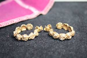 lot 196 image: 14K yellow gold signed James Avery hoop poststud earrings decorated with roses. Marked 14K JA (and logo) with original box, storage pouch and booklet. More James Avery in Lot 242