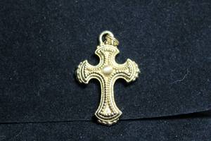 lot 198 image: 14K yellow gold Italian cross pendant. Marked 14K Italy Milor. 1.5L