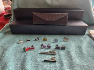 lot 30 image: Selection of cufflinks, tie clasp, in Gucci eye glass case