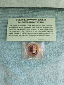 lot 81 image: 1999 Susan B. Anthony colorized collectors coin - gold plated
