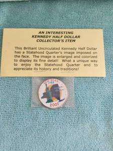 lot 93 image: 2001 Kennedy Half Dollar brilliant uncirculated colorized collector coin