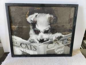 lot 184 image: Framed dog reading about cats artwork - 17 x 21