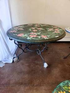 lot 100 image: Artist signed clay tabletop with floral and leaf design on green background -Table base included - 54D x 30H - Bldg. J