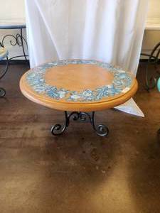 lot 180 image: Tabletop with beautiful fruit motif in blue on a tera cotta background -Table base included - 33D x 20H - Bldg. J
