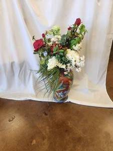 lot 39 image: Rare artist signed Vase by Colzi, Blue Irises on terra cotta background - floral included - 19H - Bldg. J
