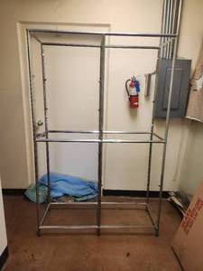 lot 43 image: Metal display rack with glass shelves - 17 x 48 x 76 - Bldg. J