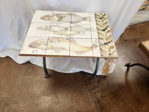 lot 67 image: Artist signed hand painted tiles, makes a beautiful top (17 x 23) for this fold out table base. Take one look at this conversation piece and youll be hooked - Bldg. J
