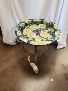 lot 69 image: Dual purpose pieces Striking sunflower covered round ceramic piece can be hung on wall or used as serving tray when used with galvanized iron base - Bldg. J