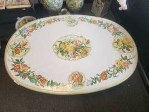 lot 103 image: Large oval clay tabletop with hand painted flowers. Galvanized table base included