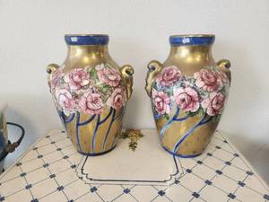 lot 105 image: Matching Vases adorned with roses on a gold background with cobalt blue accents. These rare vases are from Colzi and are no longer produced