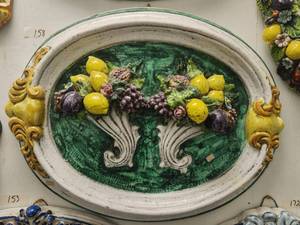 lot 158 image: Large oval wall art of fruit filled cornucopias on a green background