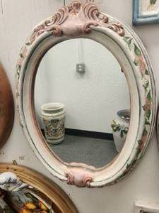 lot 188 image: Artist signed oval mirror with hand painted pastel pink hibiscus flowers (21 x 26)