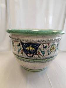 lot 163 image: Large sturdy clay cache pot in greens, blues and yellows. Includes sticker of authenticity showing it was hand made in Florence, Italy